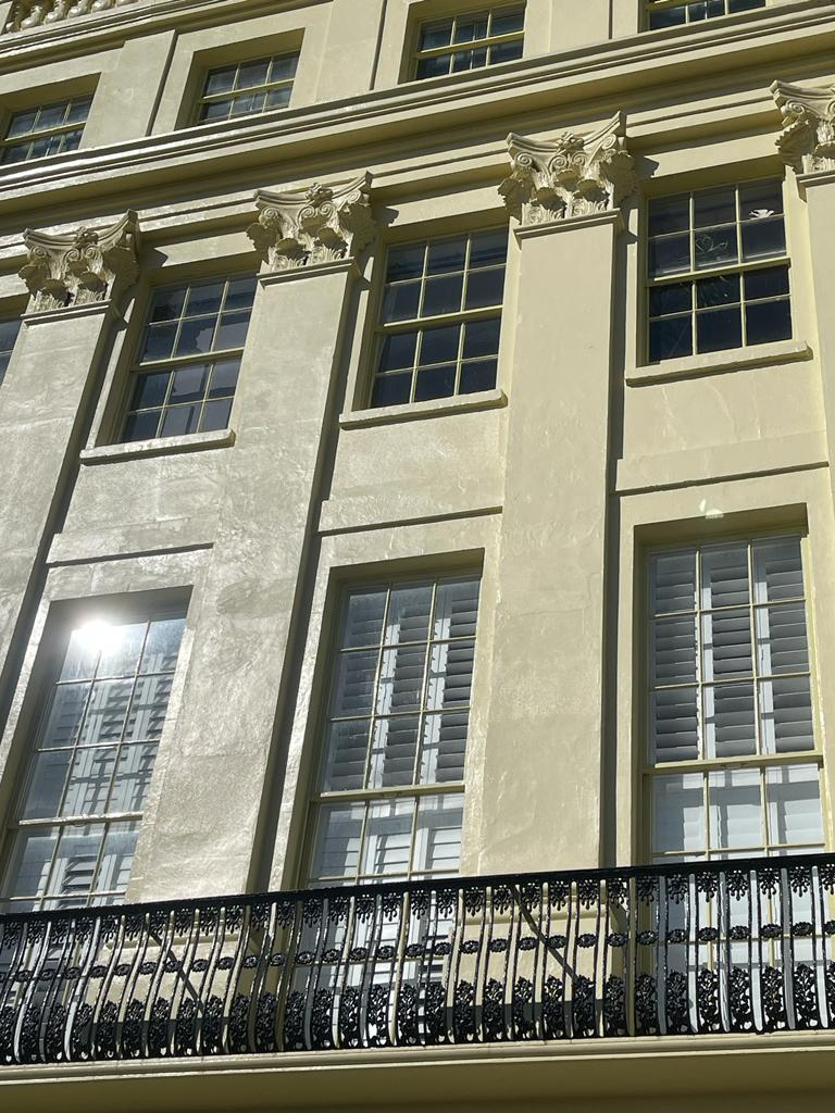 Restored Regency facade detail with Corinthian capitals